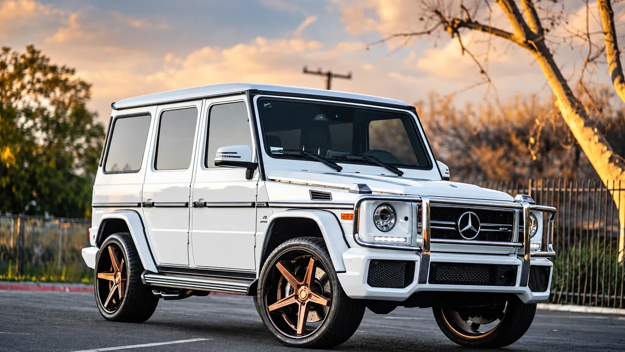 White Mercedes-Benz G-Class on bronze five-spoke wheels
