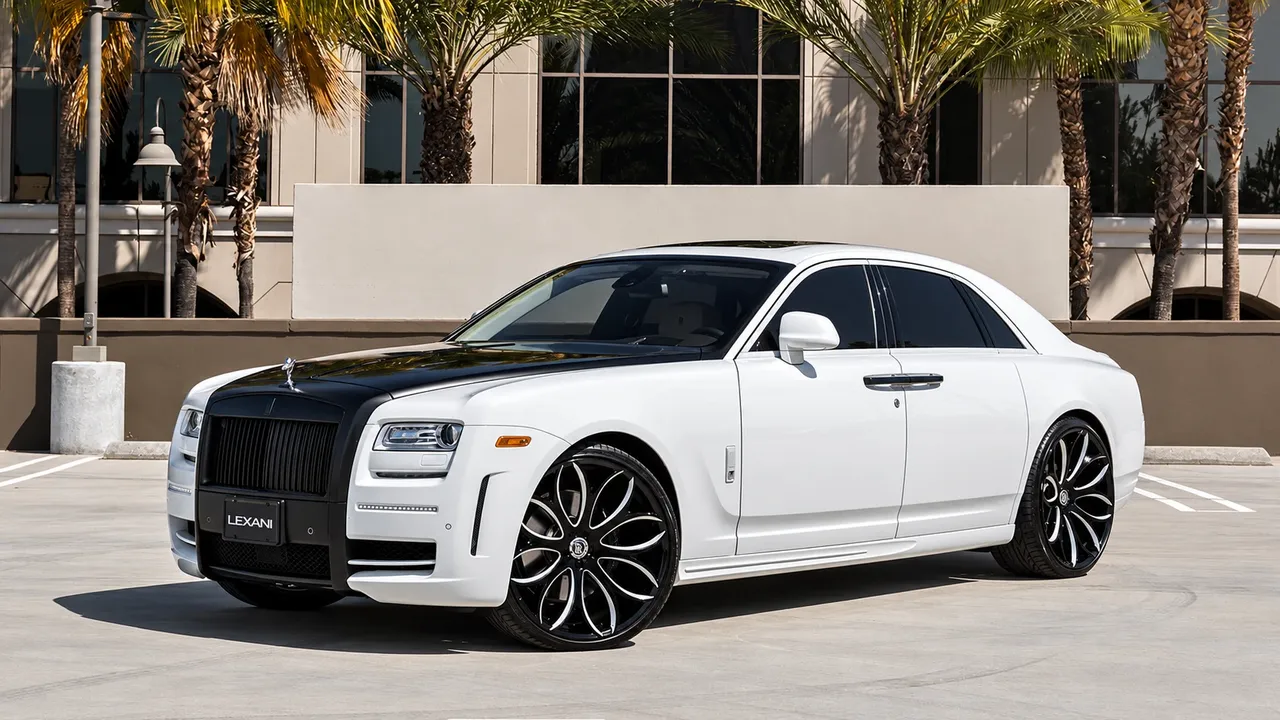 White Rolls-Royce sedan with a black hood on black multi-spoke wheels
