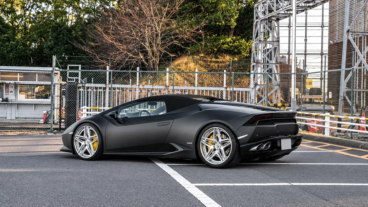 Matte grey Lamborghini Huracan on silver five-spoke wheels
